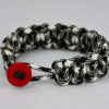 black and white camouflage paracord bracelet unity band with red button front, picture of black and white camouflage paracord bracelet unity band with red button in the front on a white background