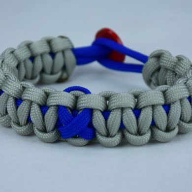 blue and grey anti bullying paracord bracelet with red button back and blue ribbon