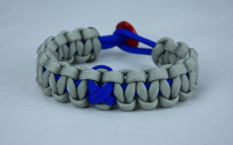 blue and grey anti bullying paracord bracelet with red button back and blue ribbon