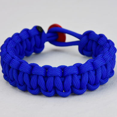 blue paracord bracelet unity band with red button, picture of a blue paracord bracelet with a red button fastener on a white background