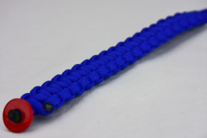 blue paracord bracelet unity band with red button, picture of a blue paracord bracelet with red button fastener in the corner