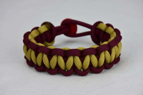 burgundy burgundy and gold paracord bracelet unity band with red button back, picture of a burgundy burgundy and gold paracord bracelet unity band with red button fastener in the back on a white background