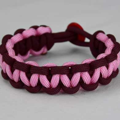 burgundy burgundy and soft pink paracord bracelet unity band with red button back, picture of a burgundy burgundy and soft pink paracord bracelet unity band with red button fastener in the back on a white background
