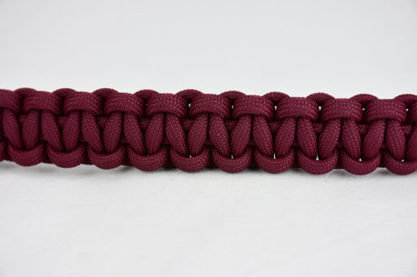 burgundy paracord bracelet unity band across the center of a white background