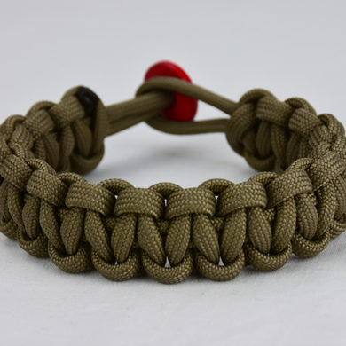 coyote brown paracord bracelet unity band with red button, picture of a coyote brown paracord bracelet with a red button fastener in the back