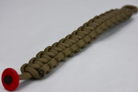 coyote brown paracord bracelet unity band with red button, picture of a coyote brown paracord bracelet with red button fastener in the front corner