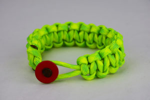 dayglow camouflage paracord bracelet unity band with red button front, picture of a dayglow camouflage paracord bracelet with red button fastener in the front on a white background
