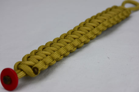 gold paracord bracelet unity band with red button in corner