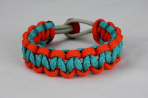 grey orange and teal paracord bracelet unity band with red button back, picture of a grey orange and teal paracord bracelet unity band with red button fastener on a white background
