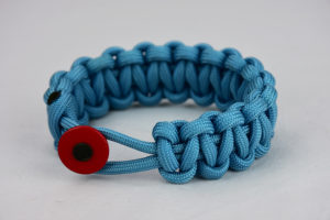 light blue paracord bracelet unity band with red button in front, picture of a light blue paracord bracelet unity band with red button fastener on a white background