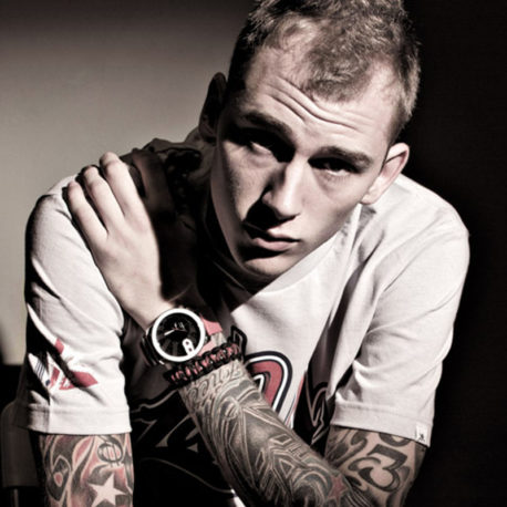 machine gun kelly wearing his unity band paracord bracelet on the cover of cleveland scene magazine