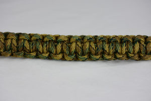 multicam camouflage paracord bracelet unity band across the center of a white background