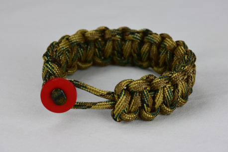 multicam camouflage paracord bracelet unity band with red button front, picture of a multicam camouflage paracord bracelet unity band with red button fastener in the front on a white background