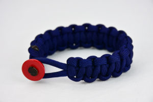 navy blue paracord bracelet unity band with red button, picture of a navy blue paracord bracelet unity band with red button fastener on a white background