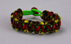neon green black and yellow camouflage and red and black camouflage rasta paracord bracelet with red button back