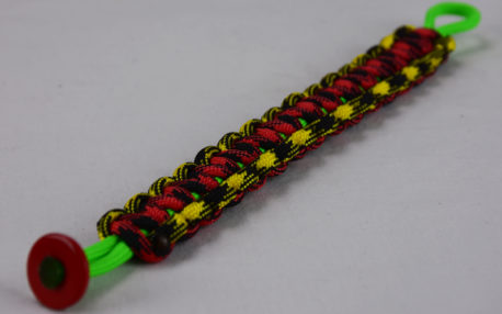 neon green black and yellow camouflage red and black camouflage rasta paracord bracelet with red button corner