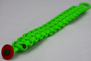 neon green paracord bracelet unity band with a red button in the front corner