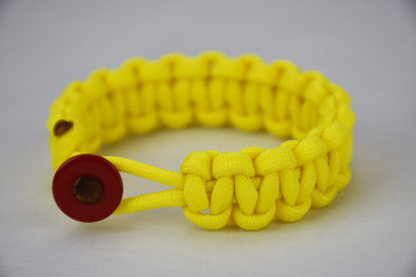 neon yellow paracord bracelet unity band with red button in the front
