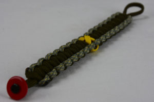 od green acu camouflage od green military support paracord bracelet with red button fastener in the corner and yellow ribbon