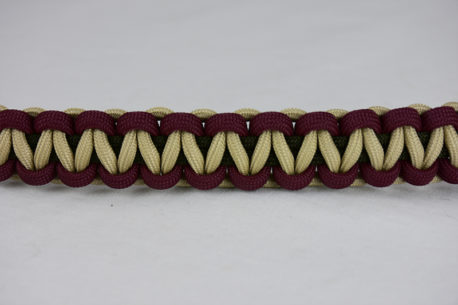 od green burgundy and desert sand paracord bracelet unity band across the center of a white background