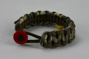 od green desert foliage camouflage desert sand foliage camouflage military support paracord bracelet with red button in front and yellow ribbon