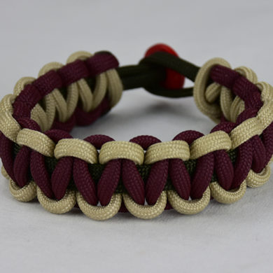 od green desert sand and burgundy paracord bracelet unity band with red button in the back, picture of an od green desert sand and burgundy paracord bracelet unity band with red button fastener in back on a white background
