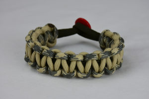od green desert sand foliage camouflage and desert sand paracord bracelet unity band with red button in the back, picture of an od green desert sand foliage camouflage desert sand paracord bracelet unity band with red button fastener in the back on a white background