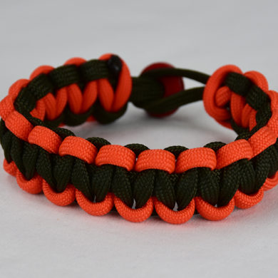 od green orange and od green paracord bracelet unity band with red button back, picture of an od green orange and od green paracord bracelet unity band with red button fastener on a white background