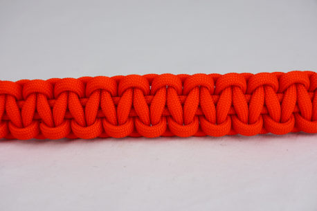 orange paracord bracelet unity band, picture of an orange paracord bracelet across the center