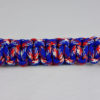 patriot camouflage paracord bracelet across the center of a white background