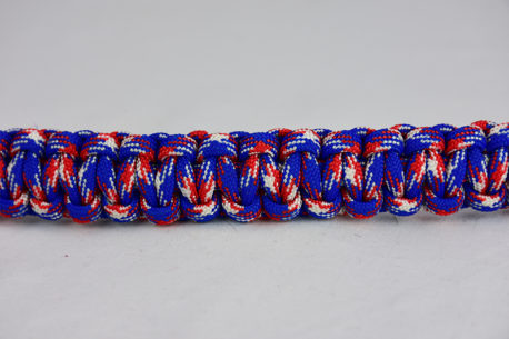 patriot camouflage paracord bracelet across the center of a white background