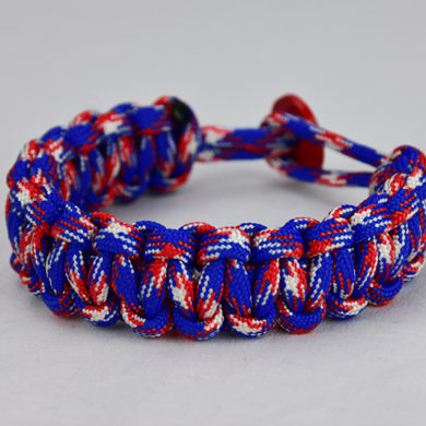 patriotic camouflage paracord bracelet unity band with red button in back, picture of a patriotic camouflage paracord bracelet unity band with red button fastener in the back, red white and blue camo