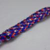 patriotic camouflage paracord bracelet unity band with red button in the corner on a white background