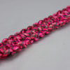 pink camouflage paracord bracelet unity band with red button in the corner, picture of a pink camouflage paracord bracelet unity band with red button fastener in the front corner on a white background