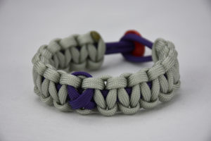 purple and grey alzheimers support paracord bracelet unity band with purple ribbon and red button, picture of a purple and grey alzheimers support paracord bracelet with red button fastener in the back