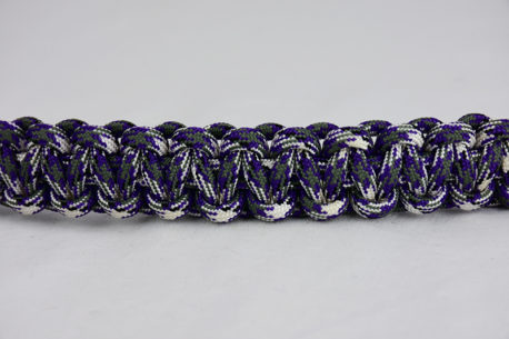 purple camouflage paracord bracelet unity band across the center of a white background