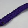 purple paracord bracelet with red button in corner, picture of a purple paracord bracelet with red button fastener in the bottom corner