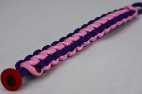 purple purple and soft pink paracord bracelet with red button in the corner, picture of a purple purple and soft pink paracord bracelet unity band with red button fastener in the bottom corner on a white background