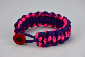 purple purple pink and purple camouflage paracord bracelet unity band with red button in the front, picture of a purple purple pink and purple camouflage paracord bracelet unity band with red button fastener in the front on a white background