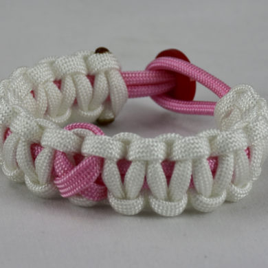 soft pink and white breast cancer support paracord bracelet w red button back soft pink ribbon