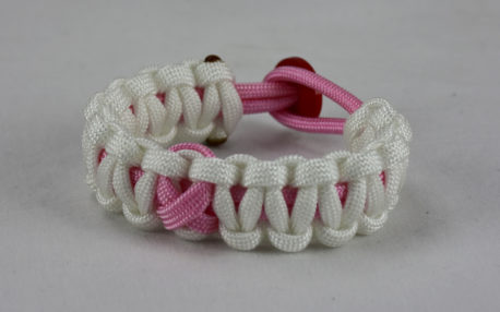 soft pink and white breast cancer support paracord bracelet w red button back soft pink ribbon