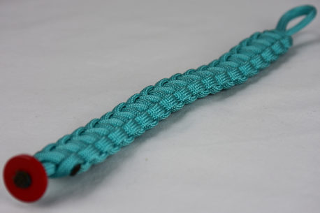 teal paracord bracelet unity band with red button in the front corner, picture of a teal paracord bracelet with red button fastener in the front corner on a white background