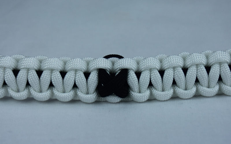 black and white pow mia support paracord bracelet with black ribbon in the center