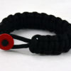 black paracord bracelet with red button front
