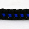 black paracord bracelet with blue line in the center