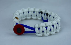 blue and white anti-bullying paracord bracelet with red button front and blue ribbon