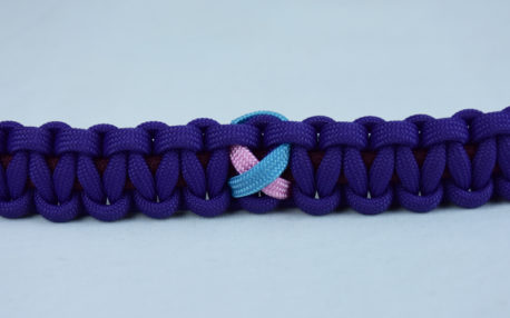 burgundy and purple sids support paracord bracelet with tarheel blue and pink ribbon in the center
