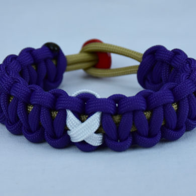 gold and purple multiple sclerosis support paracord bracelet with red button back and white ribbon