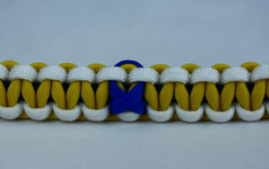 navy blue white and yellow anti bullying paracord bracelet with blue ribbon in the center