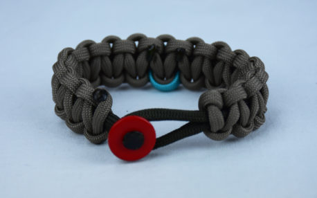 od green and tan ptsd support paracord bracelet with red button in front and teal ribbon